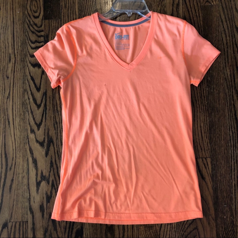 Orange Nike Dri Fit shirt